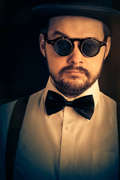 istock Man with Top Hat and Steampunk Glasses Retro Portrait 507683581