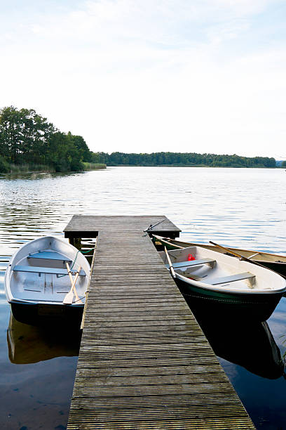 istock Rowing boats moored at the dock 507684705