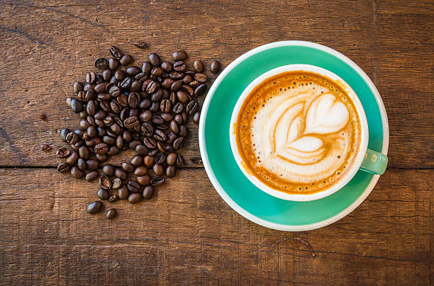 istock Latte hot coffee and roasted coffee beans. 507684802
