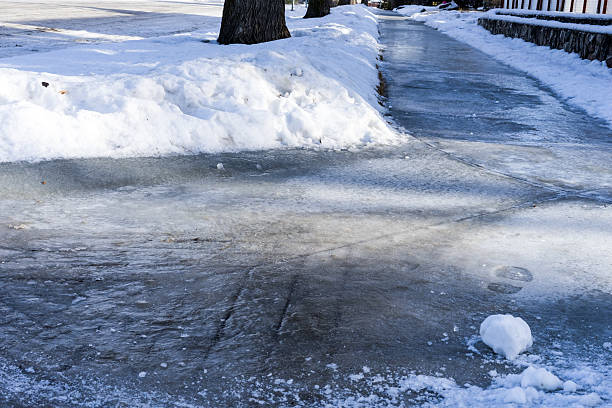 Icy sidewalk stock photo