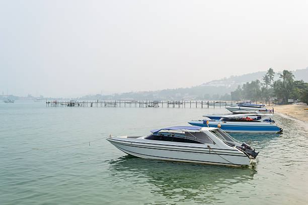 istock Speed Boats moored on tropical sea 507685364