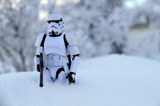 Calgary, Canada - December 27, 2015: A stormtrooper model from the Star Wars film franchise in the snow of a Calgary winter. The toy is part of the Black Series, from Hasbro.