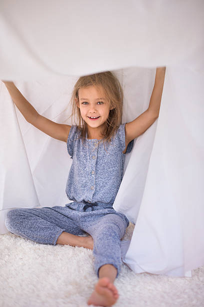 istock Girl having fun in her shelter 507686346