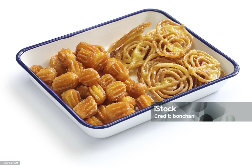 zoolbia & bamieh, iranian sweets zoolbia, deep fried pastry with saffron sugar syrup. Afternoon Tea Stock Photo