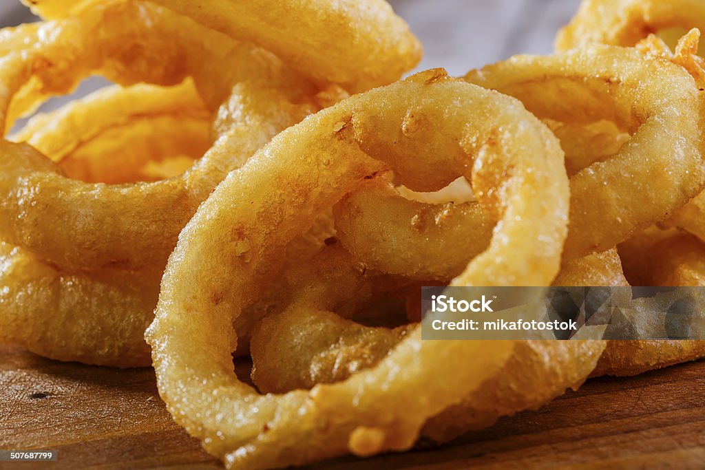 fried onion rings with red sauce Appetizer Stock Photo