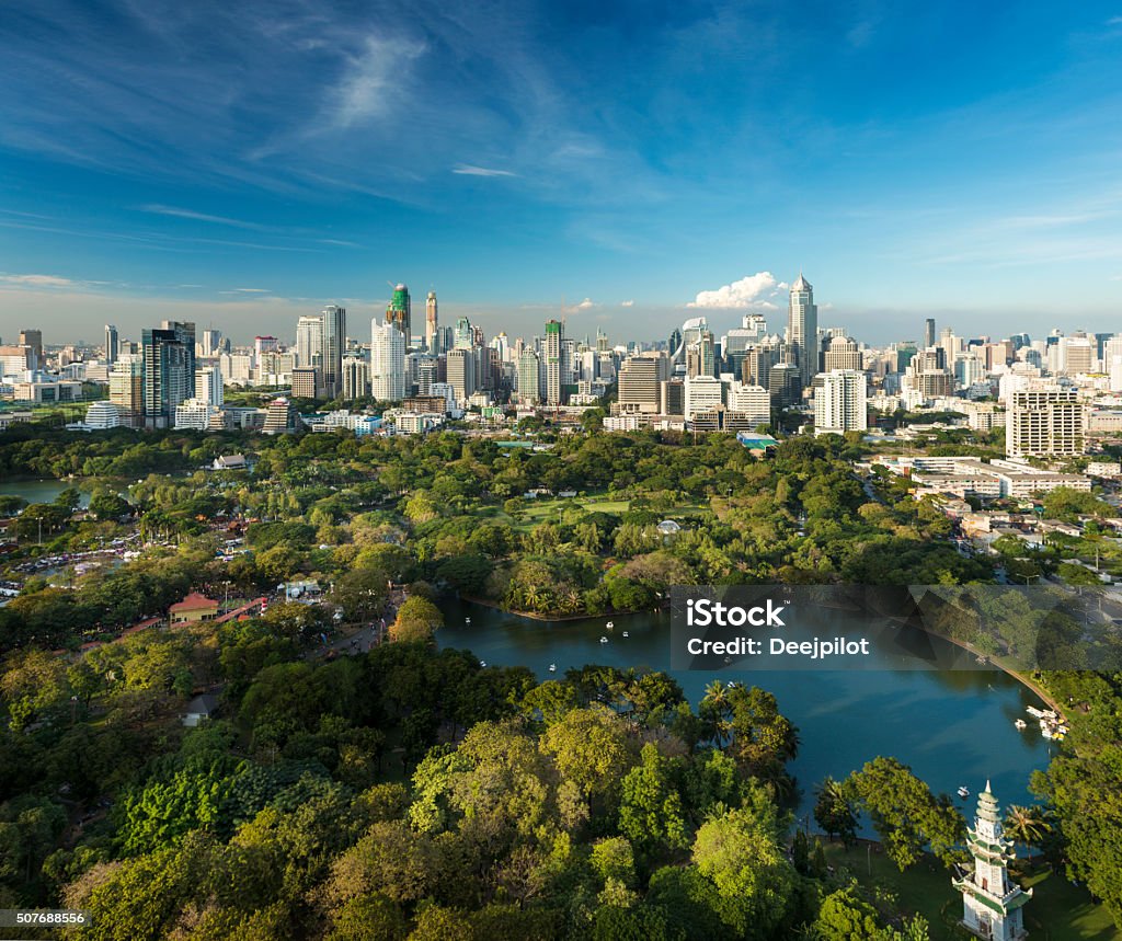 Lumphini Park and the downtown Bangkok City Skyline Thailand Bangkok Stock Photo