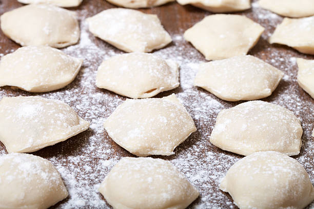 istock Pelmeni - Russian ravioli. Cooking process. Selective focus 507689566