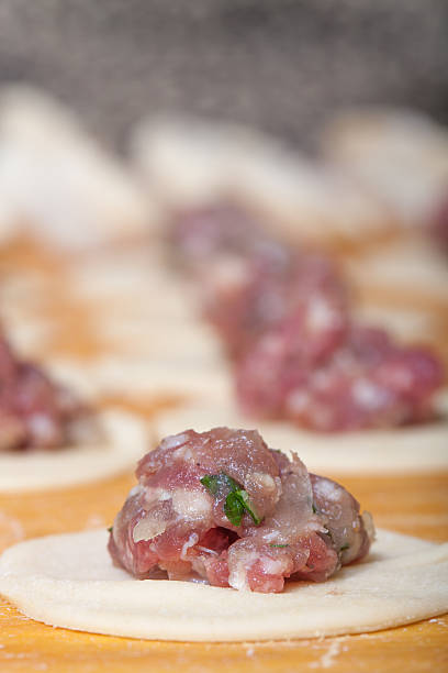 istock Pelmeni - Russian ravioli. Cooking process. Selective focus 507689914