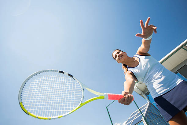 istock Young woman playing tennis 507704942