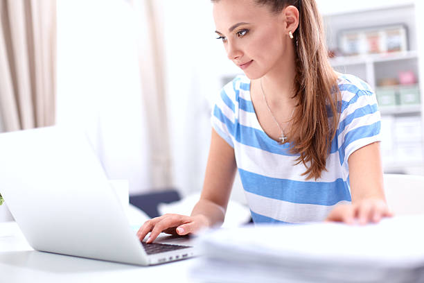 istock Woman with documents sitting on the desk 507705250