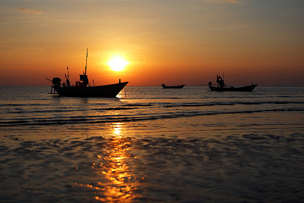istock Fishing boat at sunset 507706114