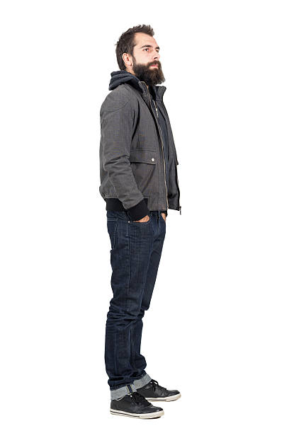 istock Side view of bearded man wearing jacket looking away. 507710492