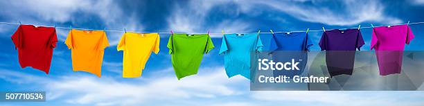 Rainbow Shirts On Line Stock Photo - Download Image Now - Laundry, Hanging, Outdoors