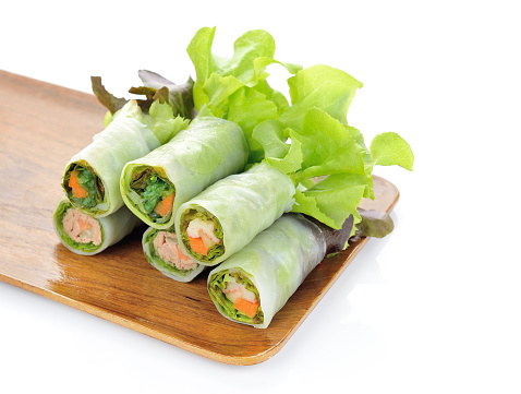 asian traditional spring rolls on white background
