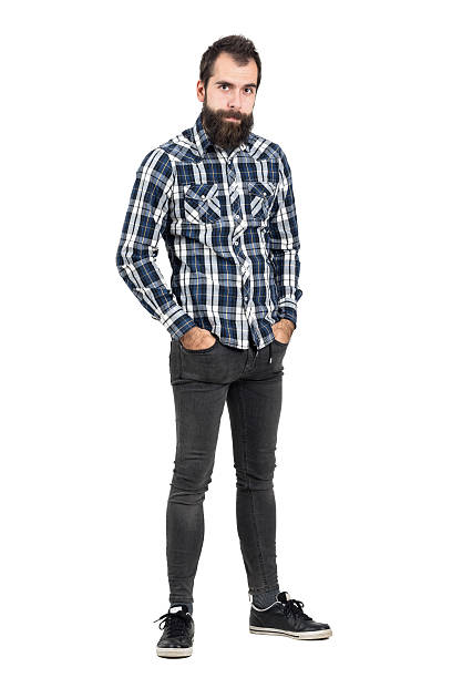 istock Funny skeptical expression of hipster with hands in pockets 507711000