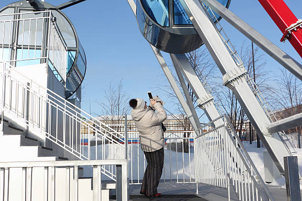 istock The woman photographing phone a cabin devil's wheels 507715080