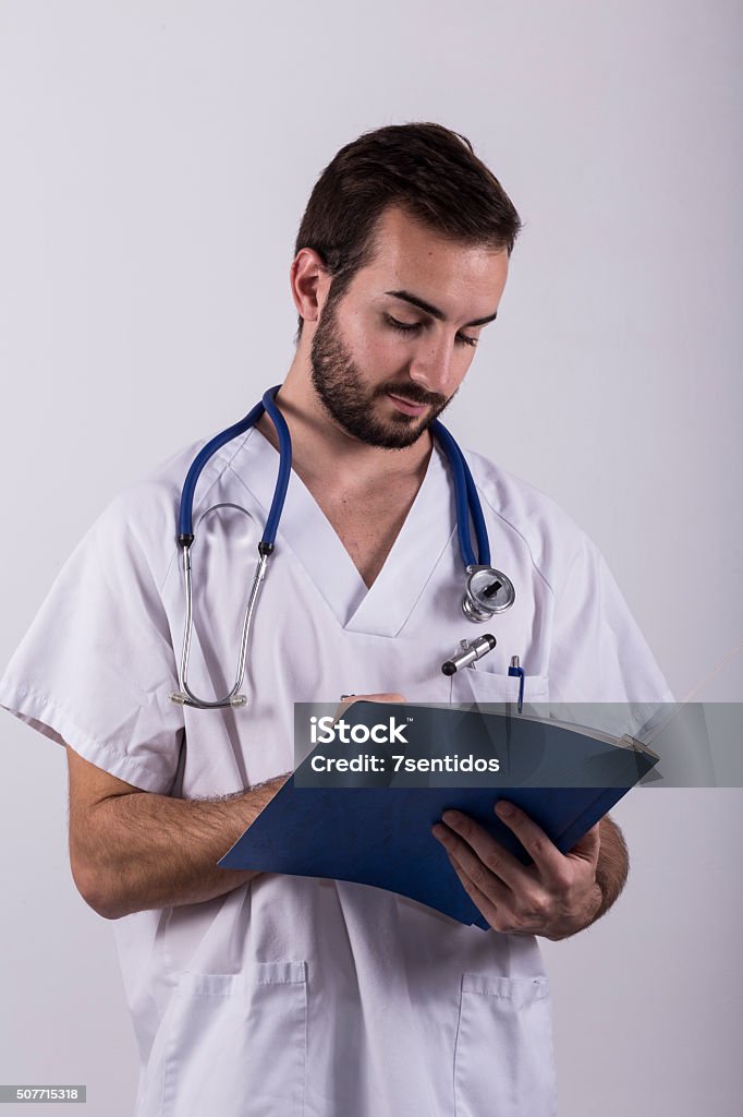 Doctor or physiotherapist Young doctor or physiotherapist projects confidence and good health Adult Stock Photo