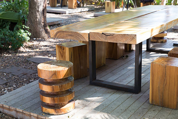 istock wooden table and stool in the garden 507715384