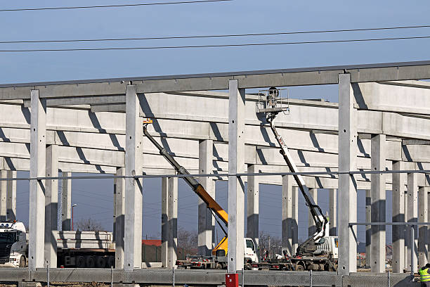 istock new factory construction site with machinery 507716094