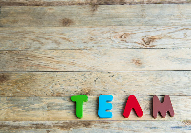 istock Colorful wooden word Team on floor4 507719969