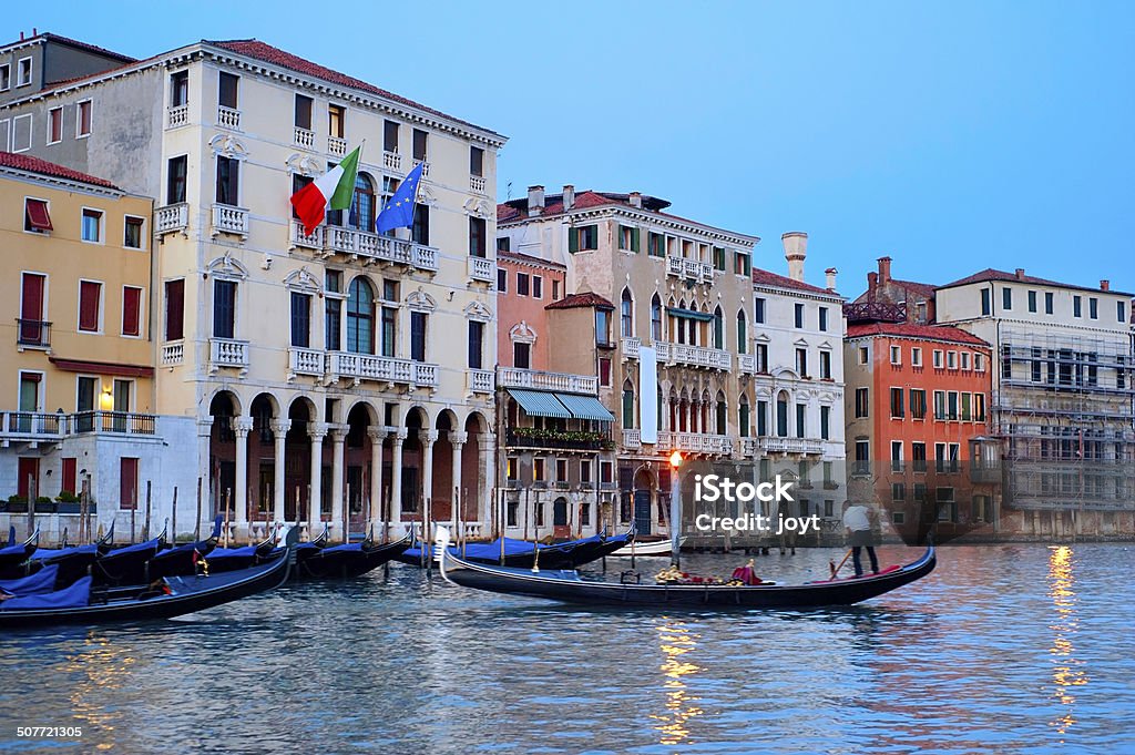 Venice scene Gondola on a canal in Venice at colorful dusk. Italy Architecture Stock Photo