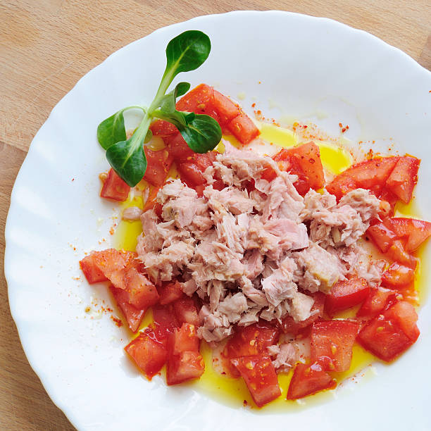 istock Spring salad with tomatoes, tuna, olive oil 507721408