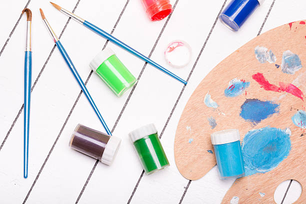 istock Watercolor and tempera with different paint brushes on a white 507722024