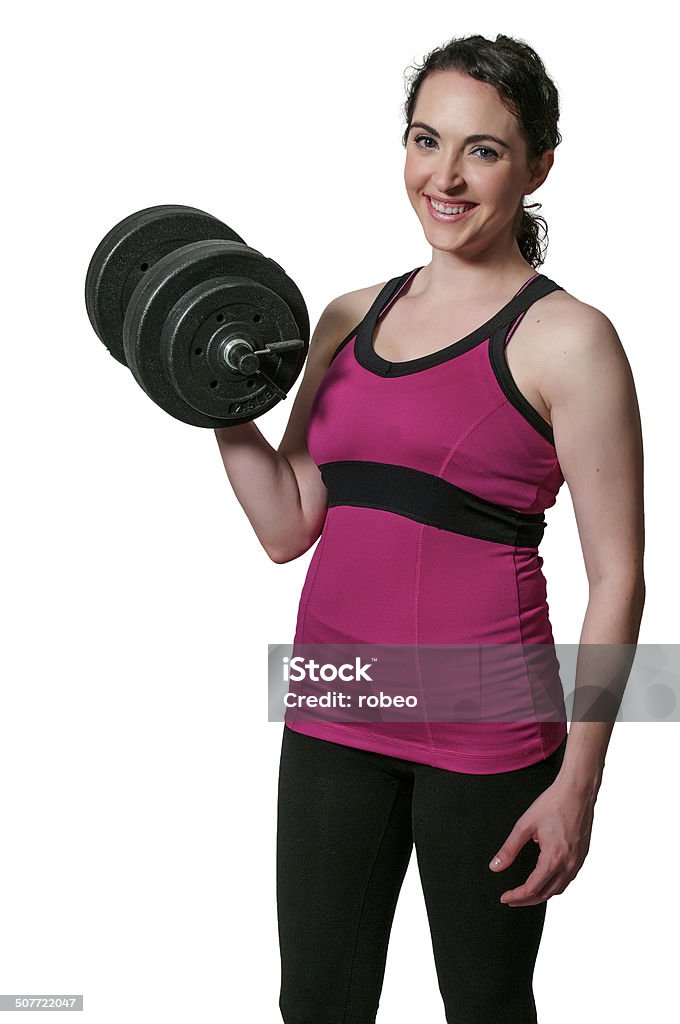 Woman Working with Weights Beautiful young woman using weights during a workout Active Lifestyle Stock Photo