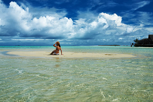 istock Woman at beach 507723177