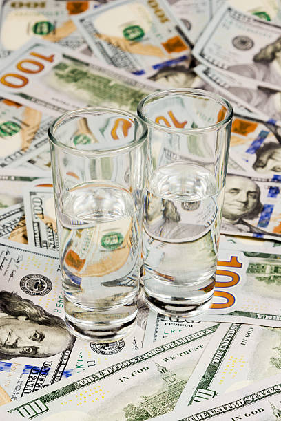 istock Alcohol and money 507727415