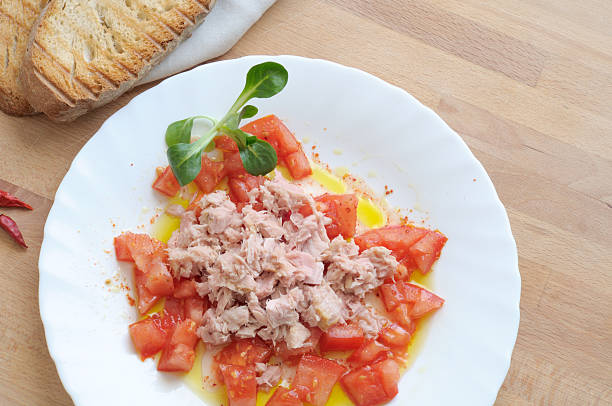 istock Salad with chopped tomatoes and tuna 507742652