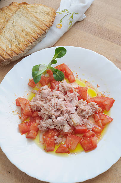 istock summer salad with tuna and chopped tomatoes 507743800