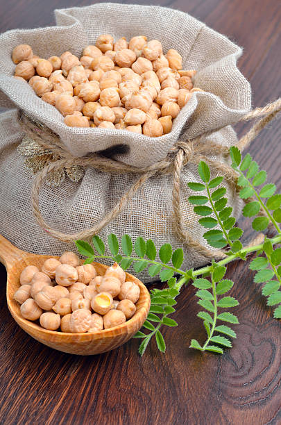 istock Chickpea varieties in a burlap bag. 507745334