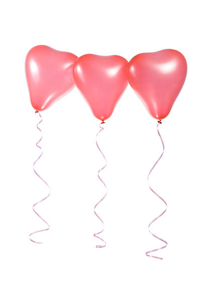 istock Three red balloons in the shape of a heart 507745566