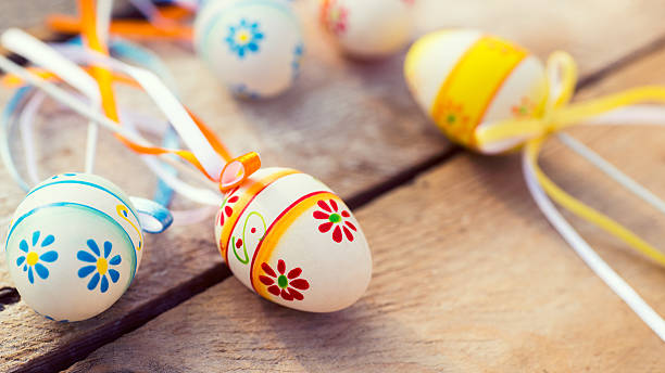 istock Colorful Easter eggs on wooden background 507745910