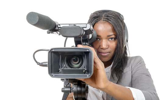 young African American women with professional video camera and