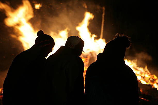 istock people in front burning woodpile german tradition 507746563