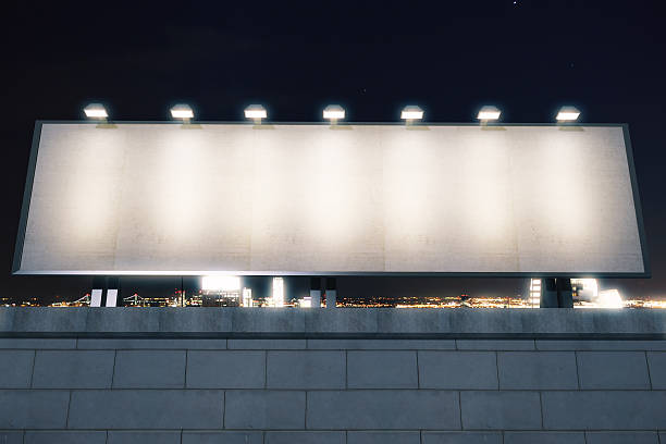 istock Blank billboard with lights on the top of brick wall 507747690