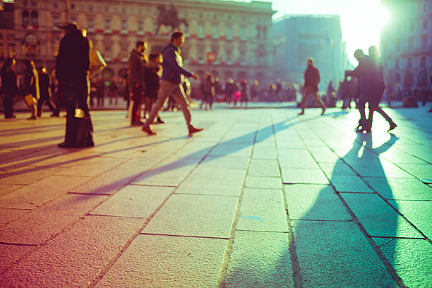 istock Intentionally blurred filtered vintage of defocused people walking 507748122