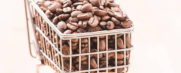 istock Shopping cart filled with roasted coffee beans 507748506