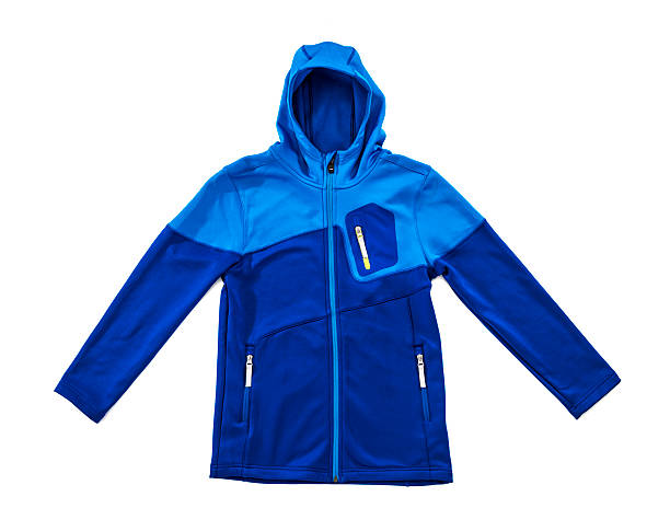Waterproof, windproof, breathable blue ski jacket with taped seams, isolated stock photo