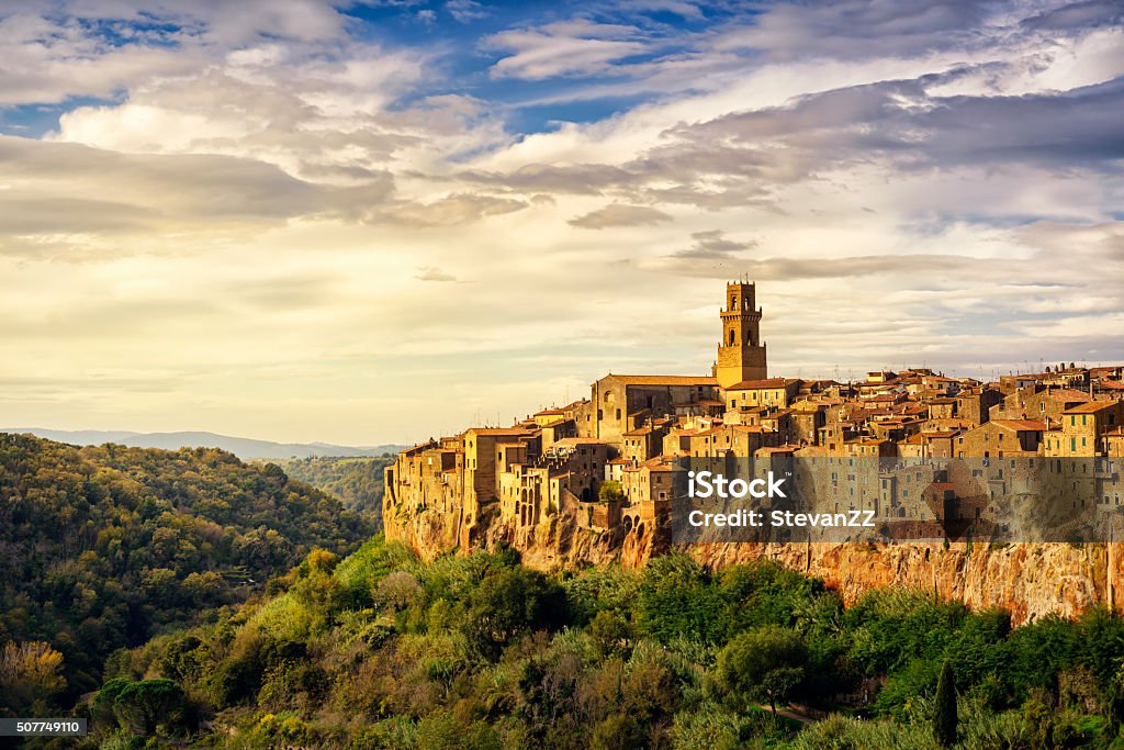 Tuscany, Pitigliano medieval village panorama landscape. Italy Tuscany, Pitigliano medieval village on tuff rocky hill. Panorama landscape high resolution photography. Italy, Europe. Pitigliano Stock Photo