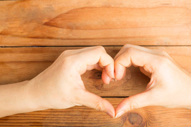 istock Female hands do hands heart 507749284