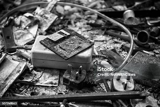 Charred Remains Of Floppy Disk And Office Equipment Stock Photo - Download Image Now