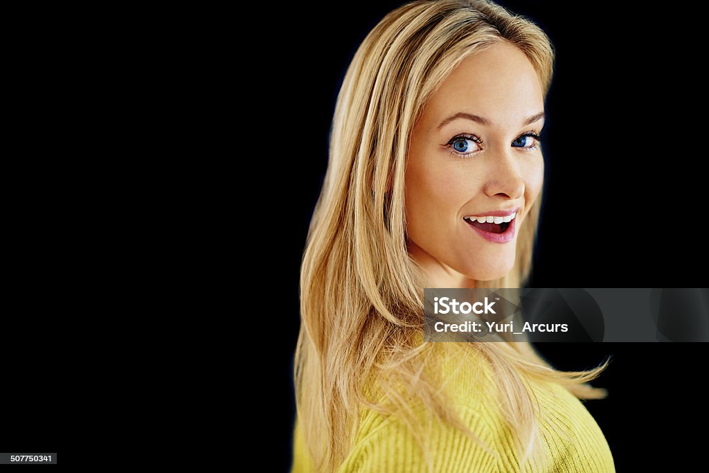 You don't say! Studio portrait of a gorgeous young blonde woman looking surprised isolated on black Adult Stock Photo