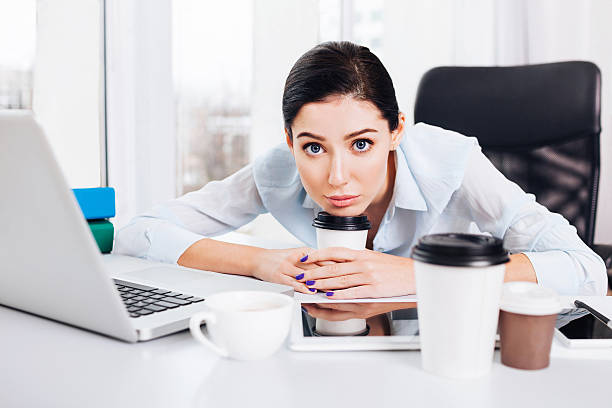 istock Tired woman in the office 507752648