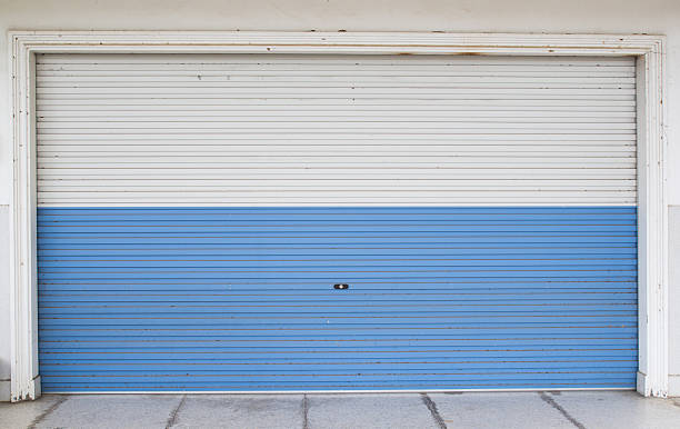 istock White with blue shutters, steel doors 507753607