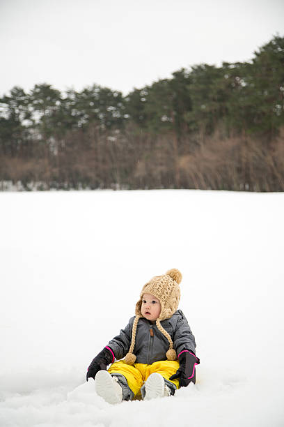 istock Baby playing outside in the snow 507753738