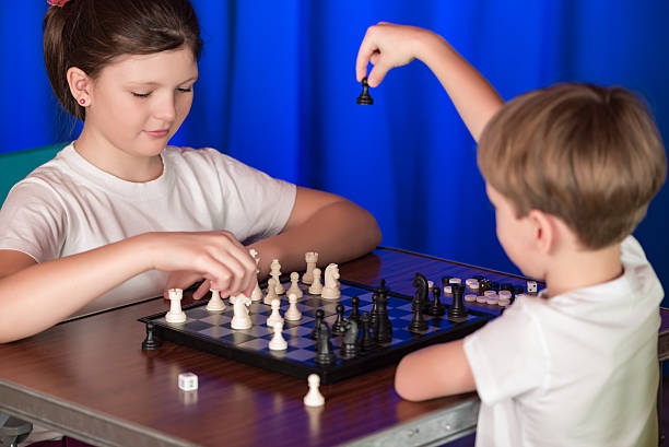 istock Children play a board game called chess. 507754030