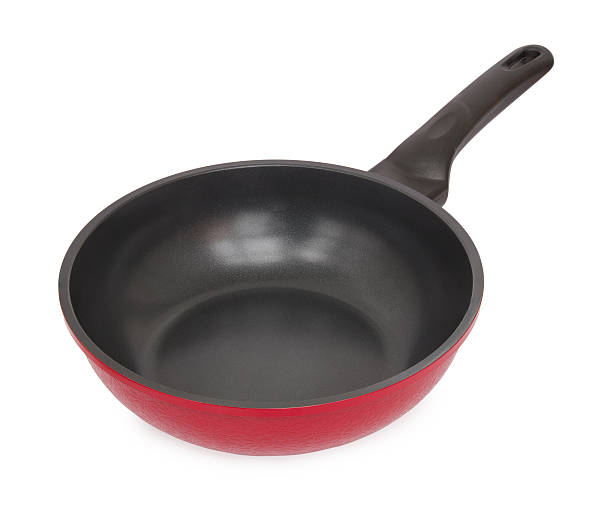 istock Red frying pan isolated on white background 507754120